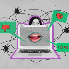 Przerażona twarz nad laptopem, z którego wydobywa się krzyk i symbole hejtu. Doxing co to? To cyberprzemoc.
