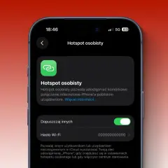 Na ekranie iPhone'a widać ustawienia "Hotspot osobisty", który pozwala udostępniać internet.