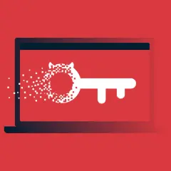Laptop z kluczem, którego część rozpada się na piksele. To wizualizacja tego, czym jest malware.