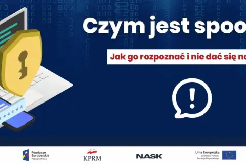 Grafika przedstawia laptopa z tarczą ochronną i telefonem, symbolizując bezpieczeństwo cyfrowe. Temat: Czym jest spoofing i jak się przed nim chronić.