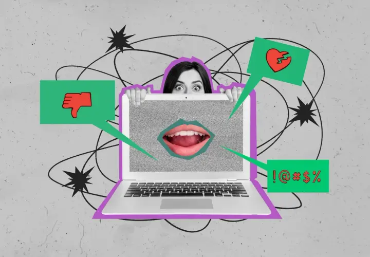 Przerażona twarz nad laptopem, z którego wydobywa się krzyk i symbole hejtu. Doxing co to? To cyberprzemoc.