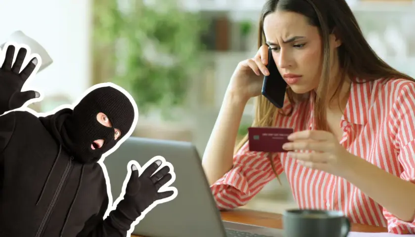 Kobieta z kartą kredytową i telefonem, obok niej złodziej w kominiarce. Uważaj na fałszywe sklepy internetowe – lista ostrzeżeń.